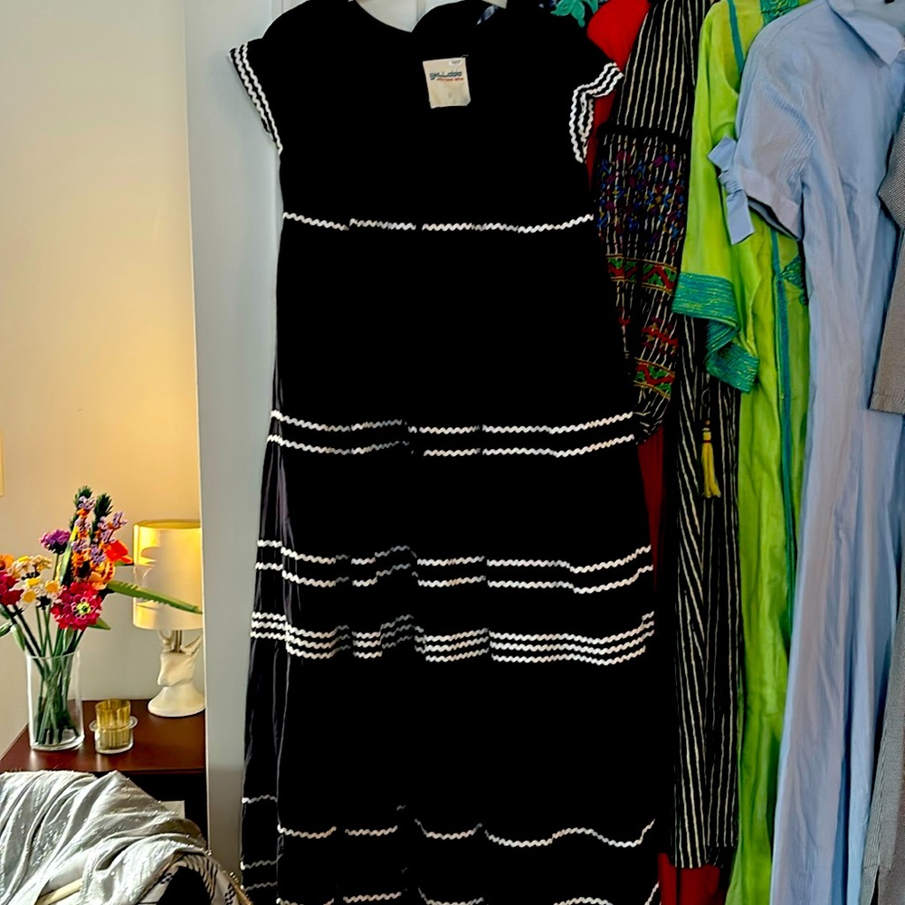 Long black, cap sleeve smock dress with white ribbon details